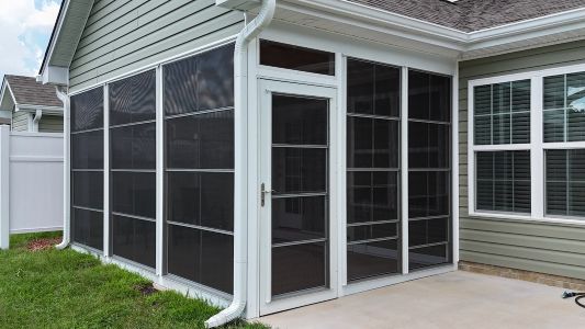 Get screened in porch to stop bugs from ruining your summer evenings